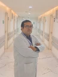 Dr Amritaksha De